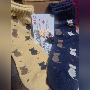 Cat lover bundle; 2 pairs of new socks, 1 navy, 1 camel, and 3 pairs of earrings